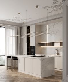 a kitchen with marble counter tops and white cabinets, along with an island in the middle