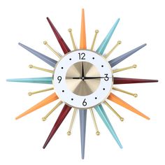 a multicolored clock with numbers on it's face is shown in the shape of a star