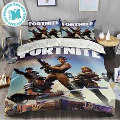 a bed with fortnite pictures on the cover and pillow cases in front of it