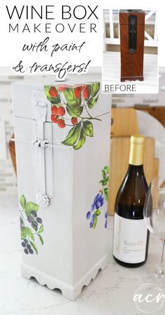 the wine box is painted with flowers and leaves on it, next to a bottle of wine