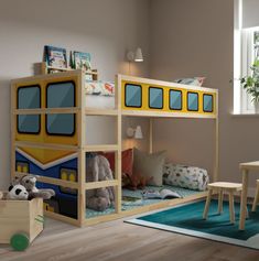 a child's bedroom with bunk beds and toys on the floor in front of it