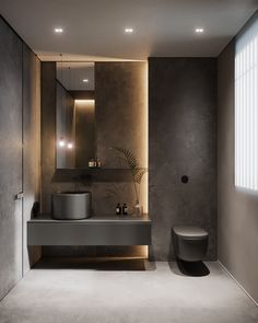 a modern bathroom with concrete walls and flooring