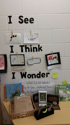 a bulletin board with pictures and writing on it that says i see i think i wonder