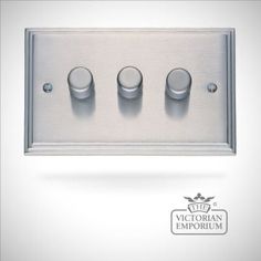 an image of three light switches on a white background with the caption victorian emporum