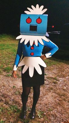 a person wearing a costume made to look like a robot