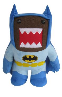 a stuffed toy with a bat on it's chest and mouth, in the shape of a monster