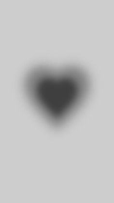 a black and white photo of a heart shaped object