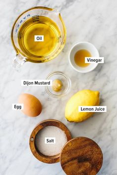 ingredients to make lemonade on a marble counter top