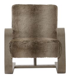 an upholstered chair with fur on it