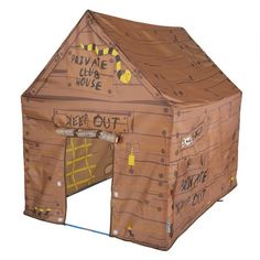 a child's play house made out of cardboard with writing on the door and windows