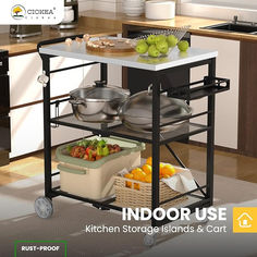 a kitchen island cart with pots and pans on it