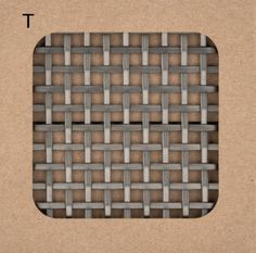 an image of a woven material in the shape of a rectangle on brown paper