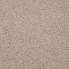 a close up view of a tan colored carpet