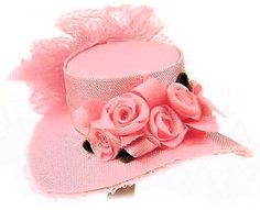 a pink hat with flowers on it