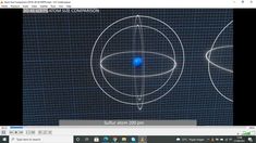 a computer screen with an image of two circles and one blue ball in the middle