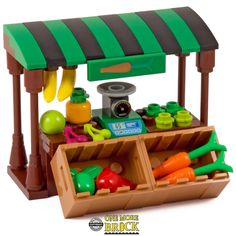 a toy store with vegetables and fruits in it's display case on a white background