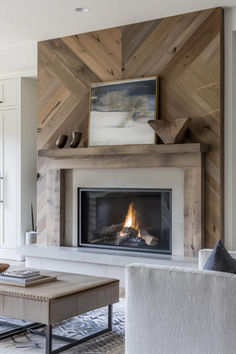 40 Stylish Wood Mantel Ideas for Modern Living Rooms Natural Wood Fireplace Wall, Fireplace Wood Plank, Chevron Wood Above Fireplace, Chevron Shiplap Fireplace Wall, Chevron Electric Fireplace Wall, Wood Fireplace Ideas, Reclaim Wood Fireplace Wall, Barnwood Wall Fireplace, Fireplace Indoor