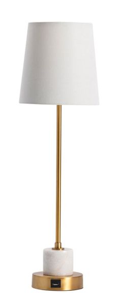 a white and gold table lamp with a white shade on the base, against a white background