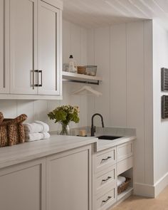 the kitchen is clean and ready to be used as a storage area for towels or other items