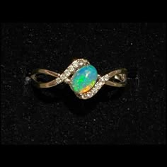 These Stunning Natural Australian Oval Opal Pave Zircon Platinum Plated, Solid Sterling Silver Bypass Ring, Stamped S925. These World Class Stones Have So Much Fire & Brilliance Photos Can’t Do Them Justice. Even My Video Hardly Represents Each Stones Mood Depending On The Lighting & Angle But I Tried My Best! Handmade Fine Jewelry Sz 6, 7, 7.5 & 8 Price Is Firm Luxury Elegant Opal Ring With Stone Setting, Luxury Opal Ring With Accent Stones As Gift, Elegant Luxury Adjustable Opal Ring, Wave Rings, Luxury Elegant One-of-a-kind Opal Ring, Luxury Multi-stone Opal Ring For Gift, Opal Ring Vintage, Pave Wedding Rings, Boulder Opal Ring