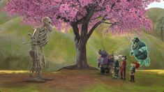 a group of people standing under a tree in the middle of a field with a skeleton on it