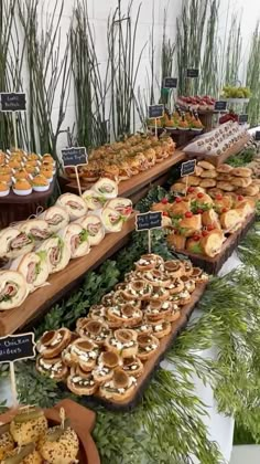 an assortment of food on display at a buffet