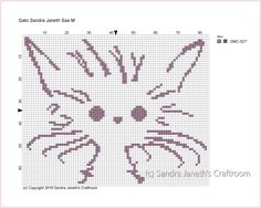 a cross stitch pattern with a cat's face