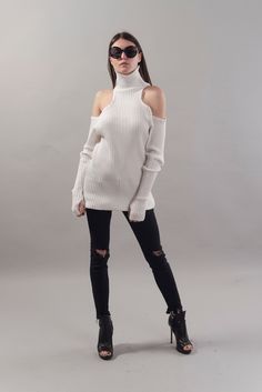 "High polo neck and open shoulders, this sweater dress has long panels outlining the asymmetric fluted hem. It is crafted from luxury wool acrylic blend. Cut for an oversized fit, with dropped shoulders, which creates a relaxed look and comfort. MATERIALS: cotton acryl blend -------------------------------------- If you have any questions about the item or have any personal requirements about the garment, please do not hesitate to send us a message, our team is available 24/7, or check out our s White Turtle Neck Sweater Dress, Luxury Oversized Winter White Sweater, Fitted White High Neck Sweater Dress, Oversized High-neck Sweater Dress For Winter, Luxury White High Neck Sweater, Maternity Fashion Dresses, Loose Sweater Dress, Strick Top, Women Turtleneck