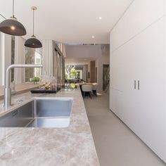 the kitchen is clean and ready to be used as a dining room or office area