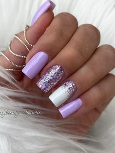 Light purple and white nails with glitter