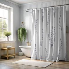 a bath room with a tub and a shower curtain