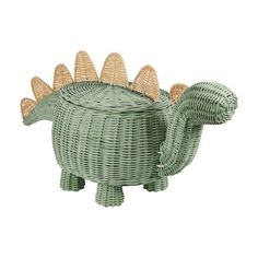 a wicker toy that is shaped like a dinosaur with its head turned to the side