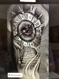 a man's arm with a clock and stairs tattoo on his left arm, which is