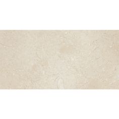 an image of a white marble tile with no pattern on the bottom and one side