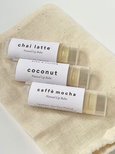 This Natural Lip Balm Set includes three flavours:  ✧ COCONUT ✧ CHAI TEA ✧ COFFEE All of our balms are handcrafted in small batches with premium natural + organic ingredients like cocoa butter, jojoba oil and pure Canadian Beeswax. No hard or waxy product here.. these buttery balms glide on like silk.. hydrating and leaving your lips feeling luxuriously smooth.  Free from artificial colorants or synthetic fragrances.  DETAILS:  [Flavour Oils -- Our Natural & Organic Flavour Oils are created and Coconut Lip Balm, Lip Balm Set, Flavored Oils, Natural Lip Balm, Hair Brands, Hair Product, Natural Lip, Chai Tea, Organic Plants