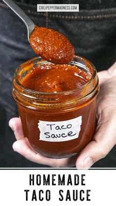 homemade taco sauce in a jar with a spoon