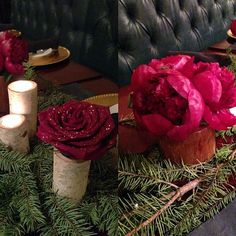 flowers and candles are arranged on the table