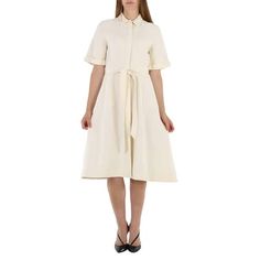 Burberry Ladies Dresses. Fashion category: Casual Dresses. SKU: 4075148. Material: Outer: 73% Wool, 27% Silk Lining: 100% Polyester. . Color: Off White. A darted shirt dress cut from a wool silk blend for soft structure. Tie the belt to cinch the waist and enhance the A-line skirt. Buttons: mother-of-pearl. Concealed button closure. Specialist dry clean. Size: 4.  Color: Off-White.  Gender: female.  Age Group: adult. Spring Half Sleeve Belted Dress, Belted Midi Dress With Half Sleeves, Cotton A-line Office Dress, Fitted Half Sleeve Shirt Dress, Beige Belted Cotton Dress, Belted Half Sleeve Midi Dress For Work, Formal Knee-length Cotton Dress, Formal Cotton Knee-length Dress, Formal Beige Collared Dress