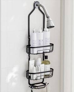 a bathroom shelf with soap, shampoo and lotion