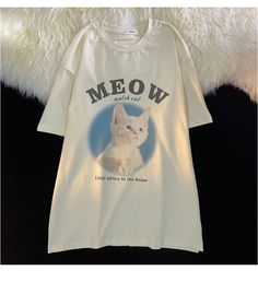 Show your love for cats with our "Meow Watch Out" Adorable Cat Lover T Shirt Streetwear. This "Meow Watch Out" Adorable Cat Streetwear t-shirt is a must-have for cat lovers everywhere. Showcasing a unique and eye-catching design of a cat, this stylish garment is sure to draw attention. Perfect for everyday wear or special occasions, this cat lover t shirt will make sure you look fashionable and make heads turn. Dimensions (cm/Inch): Custom Cat Shirt, Clothes With Cats On Them, T Shirt Cat Design, Cat Themed Things, Cute Cat Shirt, Cat Tshirt Design Ideas, Pet Tshirt Design, Cat T-shirts, Cat Shirt Outfit