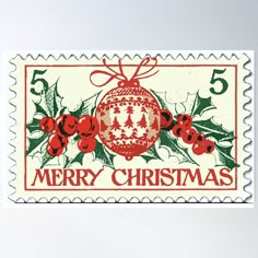 a christmas postage stamp with holly and bauble