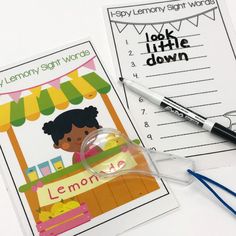 the lemonade stand sight and write activity is shown with markers, pens and scissors