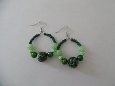 Small green leopard print hoop earrings, Beaded green earrings, Leopard print earrings, Green earrin Adjustable Green Hoop Jewelry, Green Jade Hoop Jewelry, Green Earrings With Colorful Beads, Green Bohemian Small Hoop Earrings, Bohemian Green Small Hoop Earrings, Green Hoop Earrings With Dangling Beads For Gift, Handmade Green Beaded Hoop Earrings, Green Bohemian Hoop Beaded Earrings, Handmade Small Green Hoop Earrings