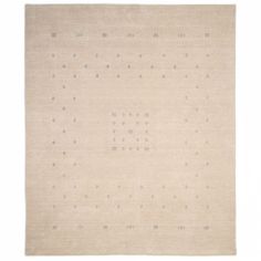 a beige rug with small dots on it