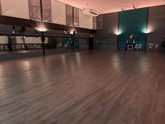 an empty dance floor in a large room