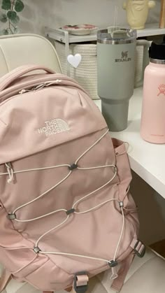 Pink North Face Backpack Aesthetic, Light Pink North Face Backpack, Dogwood Hydroflask, North Face Pink Backpack, Northface Backpacks Aesthetic, North Face Backpack Aesthetic, Pink North Face Backpack, Aesthetic Backpacks For School, Bookbag Aesthetic