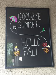 a black board with writing on it that says goodbye summer and hello fall