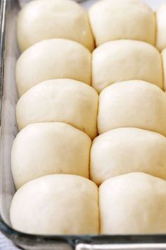 a pan filled with dough sitting on top of a table