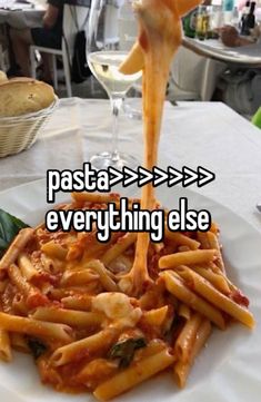 pasta is being served on a white plate with the words pasta > > > > everything else