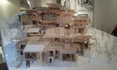 a model of a building made out of wooden slats